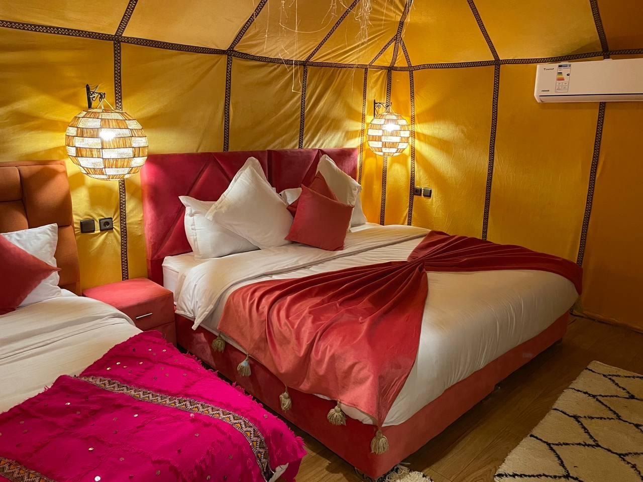 Spacious triple private tent with air conditioning and comfortable beds